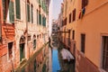 VENICE, ITALY Ã¢â¬â MAY 23, 2017: Traditional narrow canal street with gondolas and old houses in Venice, Italy. Royalty Free Stock Photo